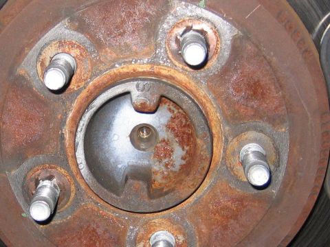 2002 Ford Crown Victoria - Notice OEM retainer clips on rear rotor.