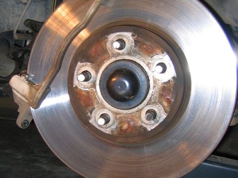 2002 Ford Crown Victoria - Notice no retaining rivets on OEM front rotor.