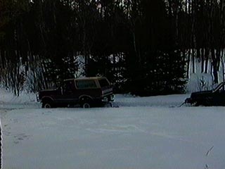 1991 Ford Bronco - Pulling Mike Moran's jeep through the deep part of the trail