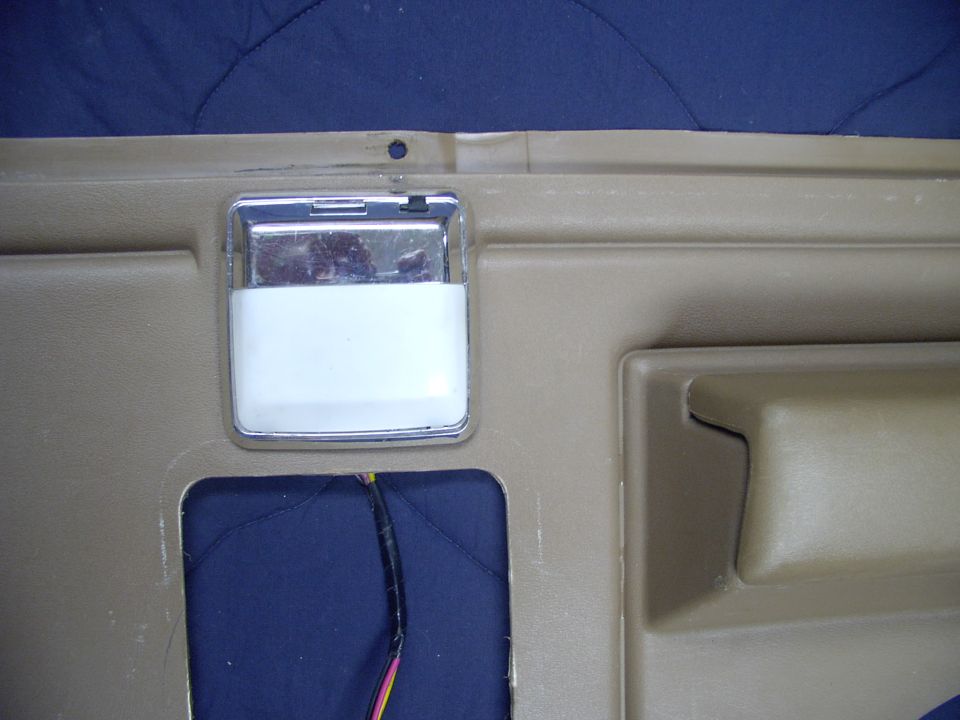 Done, like dinner. I mounted the map light and switch pointing upward, for the rear seat passenger to utilize. Mounting it downward, in my application, would have had it facing into those huge 8" midrange covers. The  dome, under the lens, will flood the rear seat area with it's partner in the other ashtray.