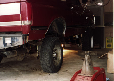 1991 Ford Bronco - Stock 28" tires are on to fit it into the garage.