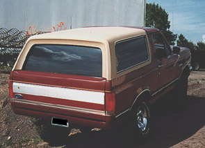 1991 Ford Bronco - Roll pan, chrome rims, and a great paint job. She was a different truck before she started seeing any action on the trail.