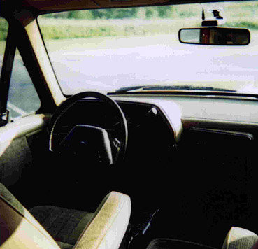 1991 Ford Bronco - View from the passenger seat looking towards the driver's side of the vehicle's interior.