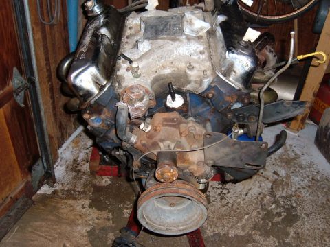 1985 Ford F-150 - Engine on stand, likely removed from a vehicle for repair or rebuild.