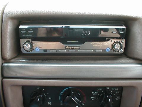 1995 Ford Bronco - Pioneer DVD/CD/MP3-CD/ V-CD/AM/FM/XM-ready Fold out in-dash 6.5" touchscreen, with in & out AUX jacks.
