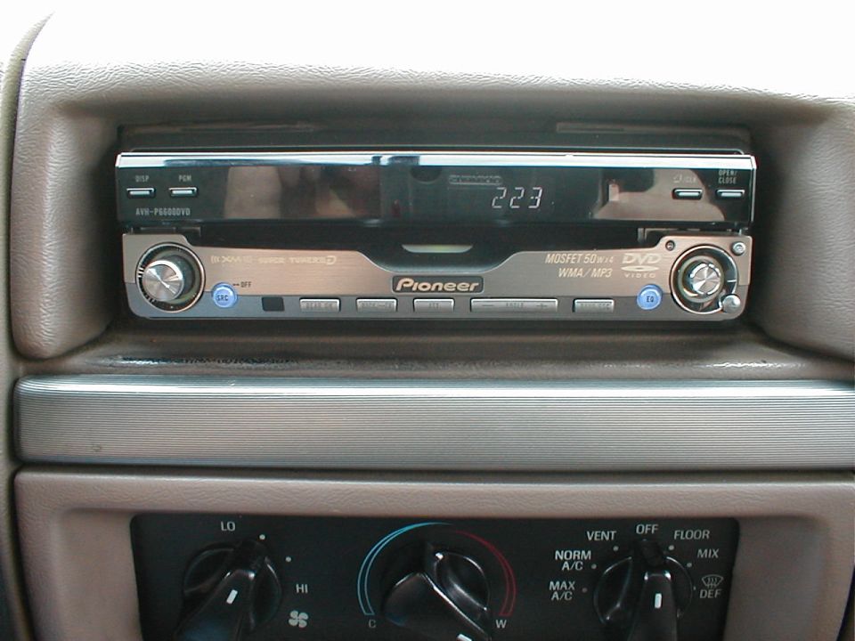Pioneer DVD/CD/MP3-CD/ V-CD/AM/FM/XM-ready Fold out in-dash 6.5" touchscreen, with in & out AUX jacks.