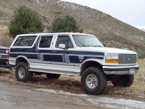 1994 Ford C-350 (Centurion Conversions) - This Ford Bronco SUV, likely from the early 1990s, is modified for off-road use.