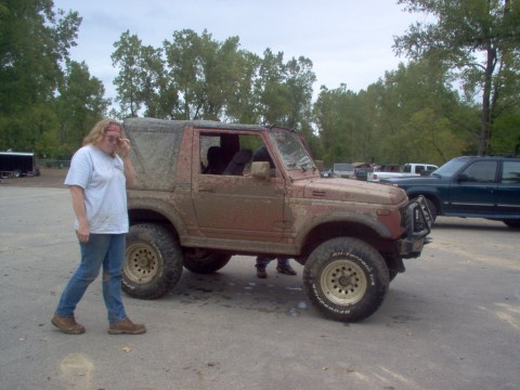 1989 Ford Bronco - Here's me in all my sad glory with the rig that towed me out of the mud hole...sad huh???? Broke the strap 3 times before I got out.