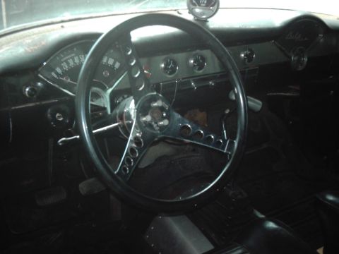 1978 Ford Bronco - Classic car interior a custom steering wheel and dashboard gauges.