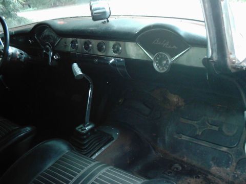 1978 Ford Bronco - Interior view of a classic car, showing the dashboard, steering wheel, and floor shifter. The 'Bel Air' script is visible on the dash.