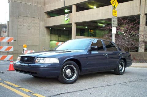 1998 Ford Crown Victoria - With the snow and rain, River Road is living up to it's name.
