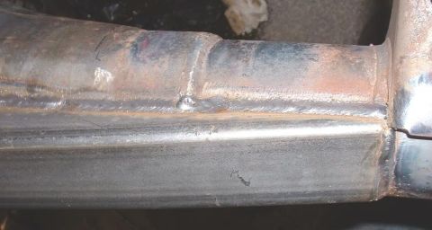 1995 Ford Bronco - This image shows a close-up view of a welded metal frame, likely part of a vehicle's chassis or structural component.