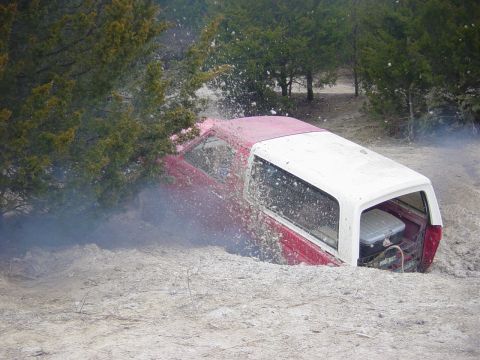 1983 Ford Bronco - The hole the Suburban is coming through is the same hole I went up in this pic.