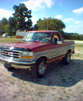 1994 Ford Bronco - This 1992 Ford F-150 pickup truck is shown from the front-right side.
