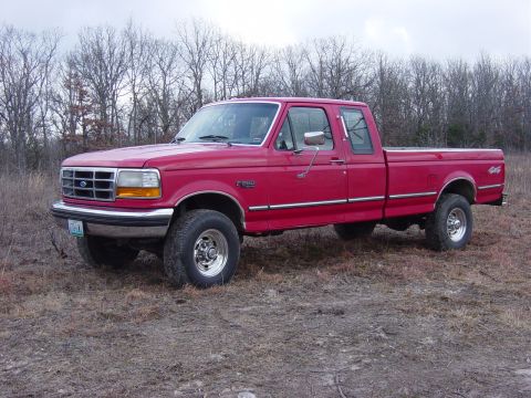 1983 Ford Bronco - This red Ford F-250 pickup truck is a 1992 model, not a 1983 Bronco.