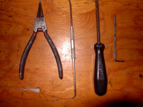 1986 Ford Bronco - What special tools are needed ? Just a philips, 9/64" alan wrench, a pick tool and some spreading circlip pliers, that's it !