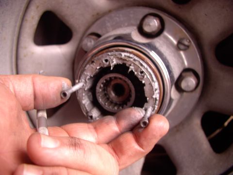 1986 Ford Bronco - Using the two screw trick, so many people here told me to use, just pull the rest out and you're free and clear of all the stock hub pieces…
