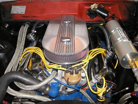 1966 Ford Fairlane - The engine compartment features a custom air cleaner and updated ignition components.