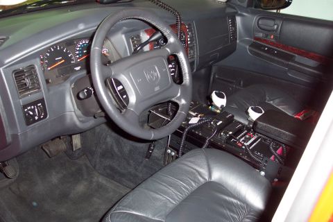 1995 Ford Bronco - Fire console w/ motorola fire(middle) and police(top) radios. Whalen siren and light control(bottom). and yeah, the seats are heated.