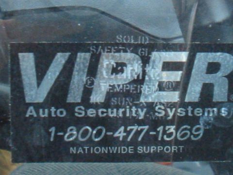 1992 Ford Bronco - A Viper Auto Security Systems sticker is visible on a vehicle's window, showing a phone number for nationwide support.