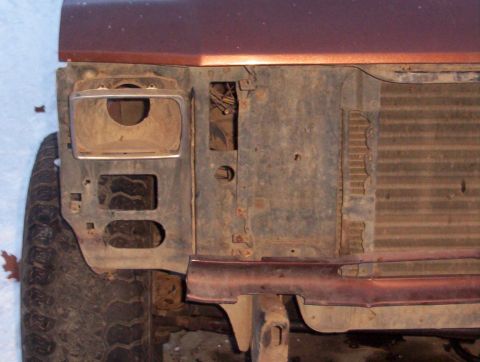 1981 Ford Bronco - from the front, you can see the cut to the right of where the headlight was, I am going to follow that cut up to the hood, dovetail it
