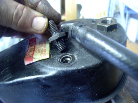 1986 Ford Bronco - Mine had one stud on the back of the pump to hold the 78 van bracket on with a nut.