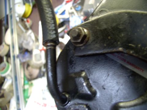 1986 Ford Bronco - I choose to put the new low pressure hose on now, while it's on the bench and easy to tighten the two opposed hose clamps I'm using to ensu…