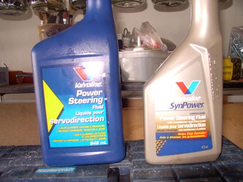 1986 Ford Bronco - I had been using the synthetic stuff on the right, but I'm going to flush it out and use the regular thicker stuff. I'd developed a very sl…