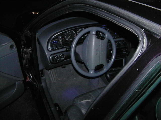 1995 Ford Contour interior with gray dashboard and steering wheel
