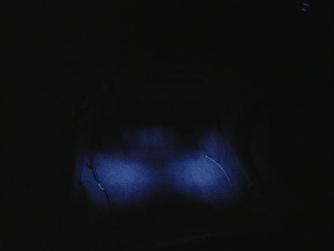 1995 Ford Contour - Interior view of a vehicle with illuminated blue lights and visible wiring.
