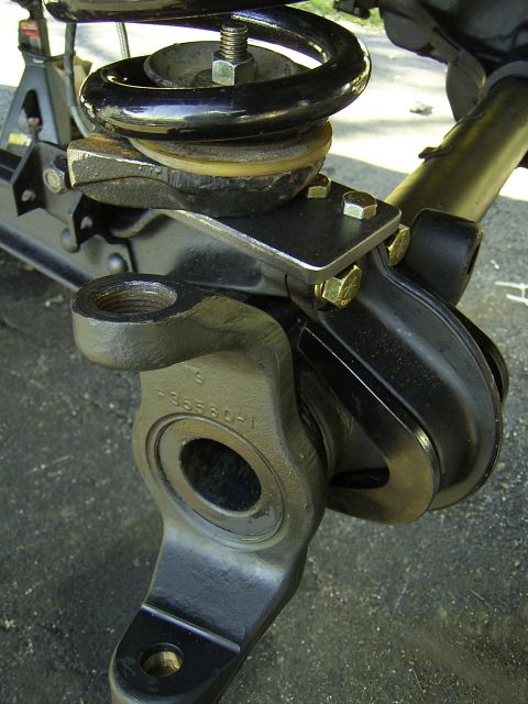1995 Ford Bronco - A close-up view of a vehicle's suspension system, highlighting a specific component with a visible part number.