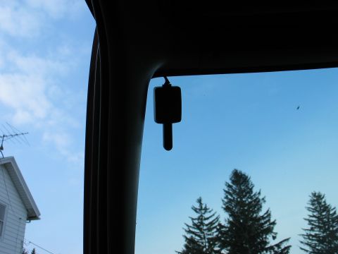 1995 Ford Bronco - A dashcam is visible inside a vehicle, mounted on the windshield.