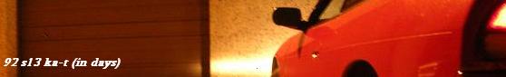 Red coupe at night by garage, warm lighting, text '92 s13 ka-t (in days)'