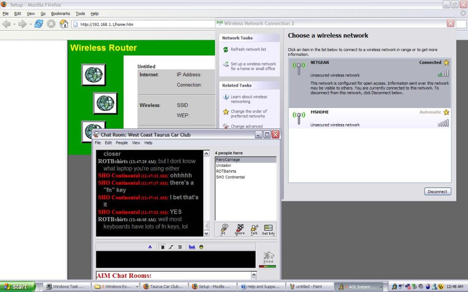 Computer screen with wireless router setup and chat room titled West Coast Taurus Car Club