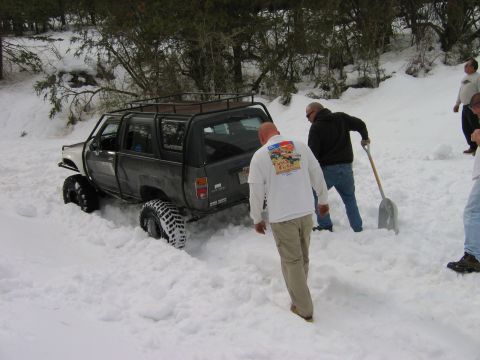 1985 Ford Bronco - 10 feet in front of me. the hellrasier guys eventually installed snow chains and kinda drove out. i winched them backwards onto the snow ch…