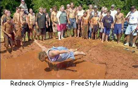 1979 Ford Bronco - A group of people watch as one person is launched through the air during a mud sport event.