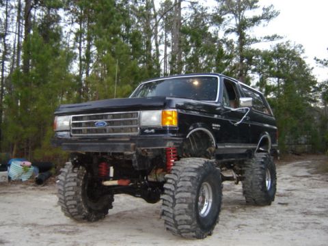 1989 Ford Bronco - This modified 1987 Ford Bronco sits high on massive tires, ready for off-road adventures.