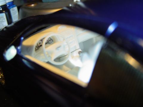 1979 Ford Bronco - Close-up of a model car's interior, revealing the dashboard and steering wheel details.