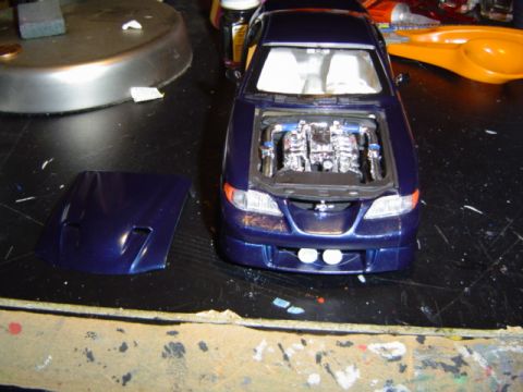 1979 Ford Bronco - Model car with its hood removed, revealing a detailed engine bay.