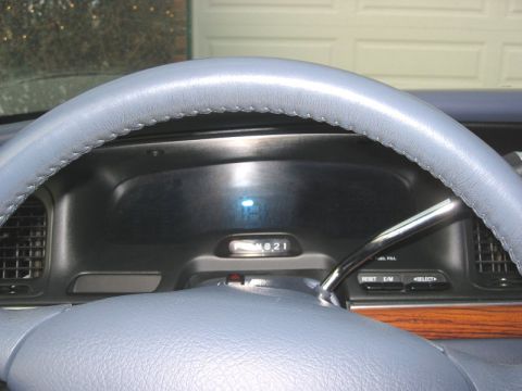 1997 Ford Crown Victoria - The digital odometer displays 021 miles on this 1997 Ford Crown Victoria's dashboard.