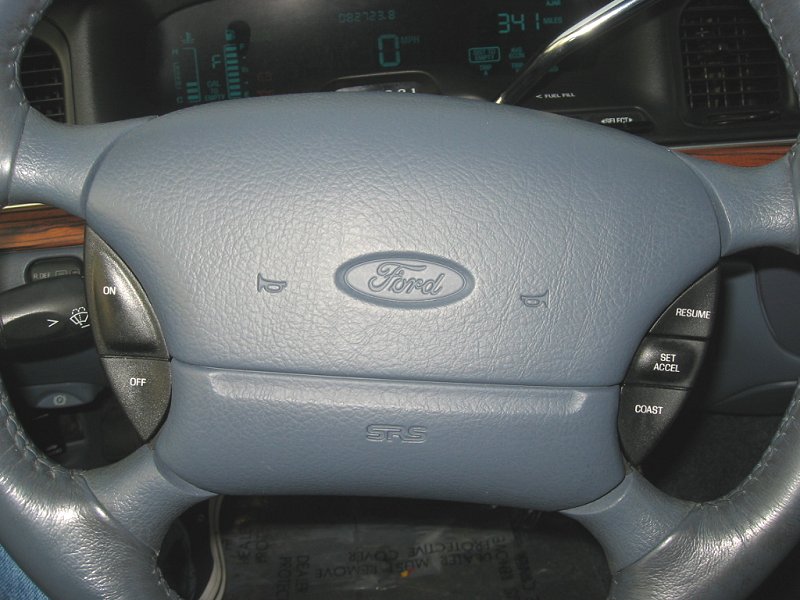 Ford steering wheel airbag center with cruise control buttons
