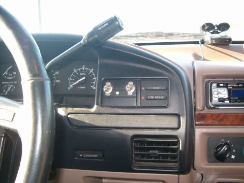 1996 Ford Bronco - Interior view of a 1996 Ford Bronco, showing the dashboard controls and steering wheel.