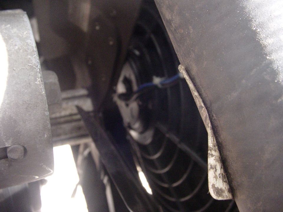 FAN MONTED ON RADIATOR IN FRONT OF FLEX FAN.