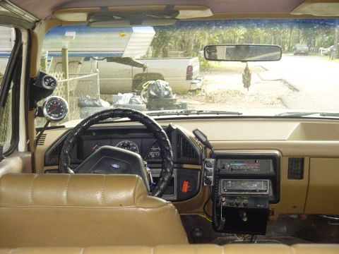 1989 Ford Bronco - sun pro temp gauge and super tach II mounted on the pillar.
