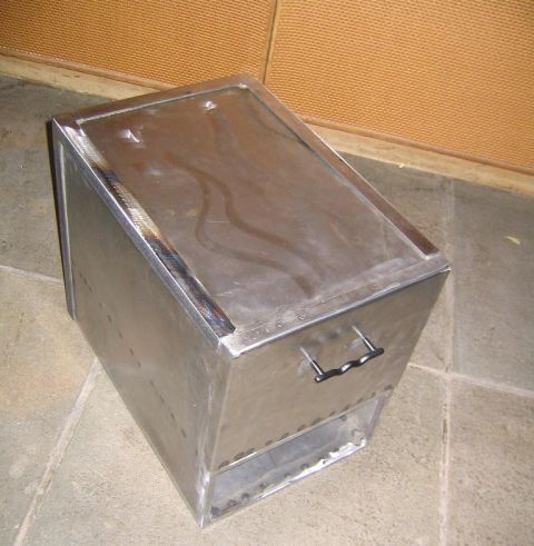 1978 Ford Bronco - A custom-made metal box with a hinged lid and a handle is shown on a tiled floor.