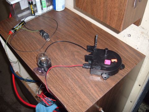 1994 Ford Bronco - An underhood light assembly is shown connected to a battery and other electrical components.