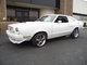 1978 Ford Mustang II - 1978 Ford Mustang II coupe, front 3/4 view, showing custom wheels and body lines.