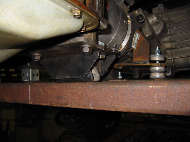 Transmission snubber bolted to a new steel crossmember, viewed from below
