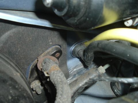 1994 Ford Probe - Close-up view of engine bay components, including hoses and metal brackets, with a Supermotors.net watermark visible.