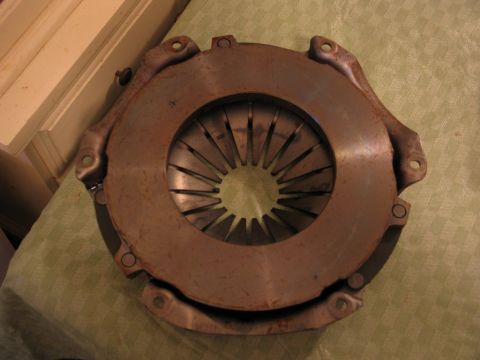 1989 Ford F-150 - A rusty clutch pressure plate is shown, likely a replacement part.